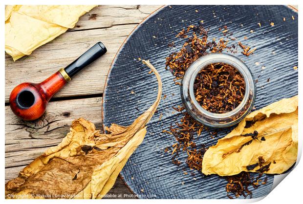 Smoking pipe with tobacco leaves,top view Print by Mykola Lunov Mykola