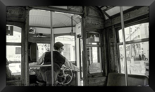 Lisbon City The Tram Driver Framed Print by Peter F Hunt