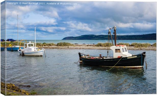 Afloat in Red Wharf Bay Anglesey Wales Canvas Print by Pearl Bucknall