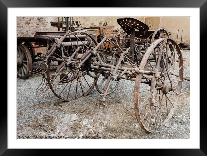 old agricultural machine Framed Mounted Print by daniele mattioda