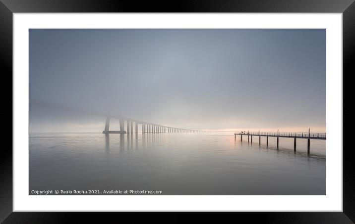 Long bridge over tagus river in Lisbon at sunrise with fog Framed Mounted Print by Paulo Rocha