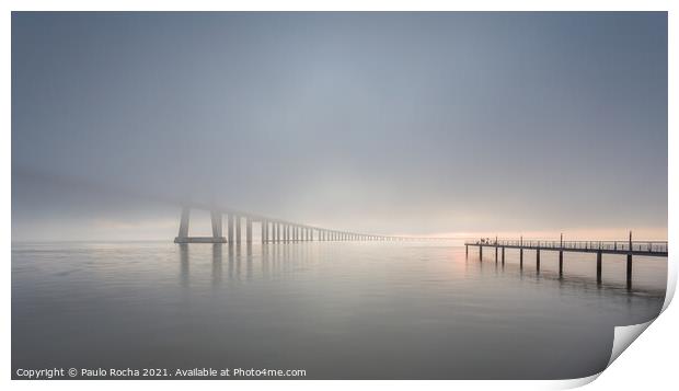 Long bridge over tagus river in Lisbon at sunrise with fog Print by Paulo Rocha