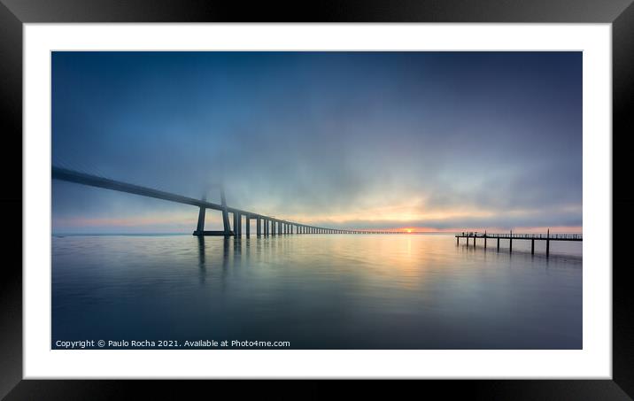 Long bridge over tagus river in Lisbon at sunrise with fog Framed Mounted Print by Paulo Rocha
