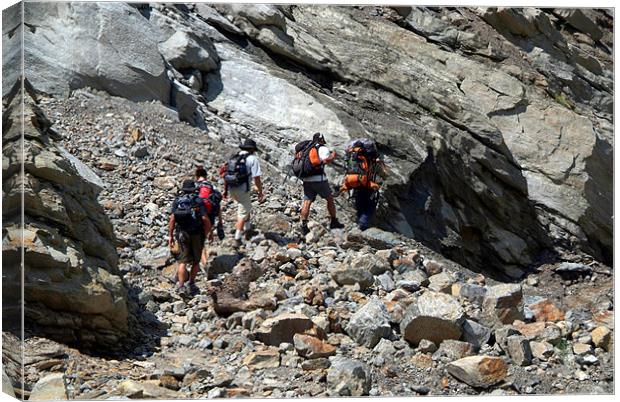 Trekkers Climbing over Landslide Canvas Print by Serena Bowles
