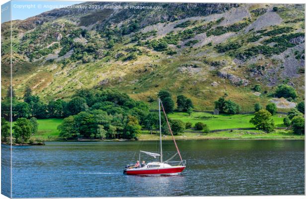 Yacht motoring south on Ullswater Canvas Print by Angus McComiskey