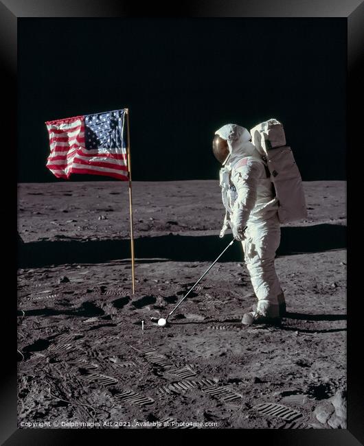 Astronaut playing golf on the moon, space golf Framed Print by Delphimages Art
