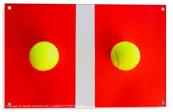 two tennis balls divided by a field line Acrylic by daniele mattioda