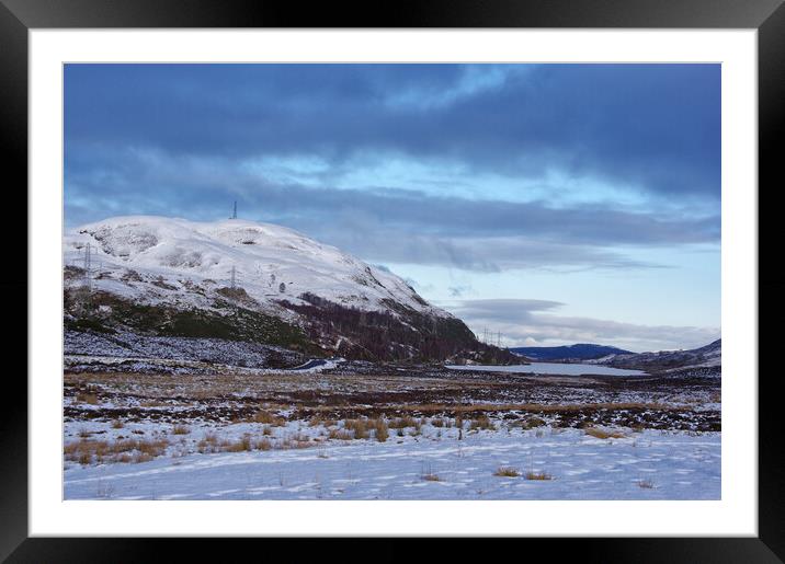 Snowy Mountain beside a Highland Loch Framed Mounted Print by Jacqi Elmslie