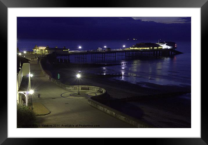 Cromer Pier at night Framed Mounted Print by Rob Hawkins