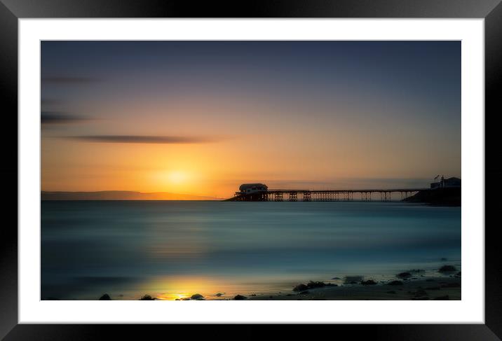 Sunrise overlooking the sea and Mumbles Pier in Swansea Framed Mounted Print by Alan Le Bon