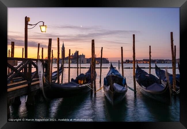 Gondolas at dawn in Venice  Framed Print by Marcin Rogozinski