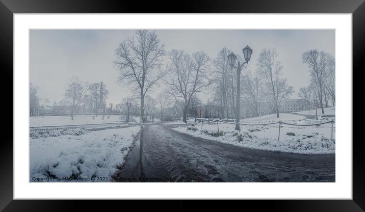 Foggy covered in snow city park in winter Framed Mounted Print by Maria Vonotna