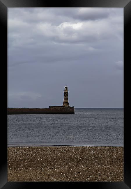Piering at roker lighthouse Framed Print by Northeast Images
