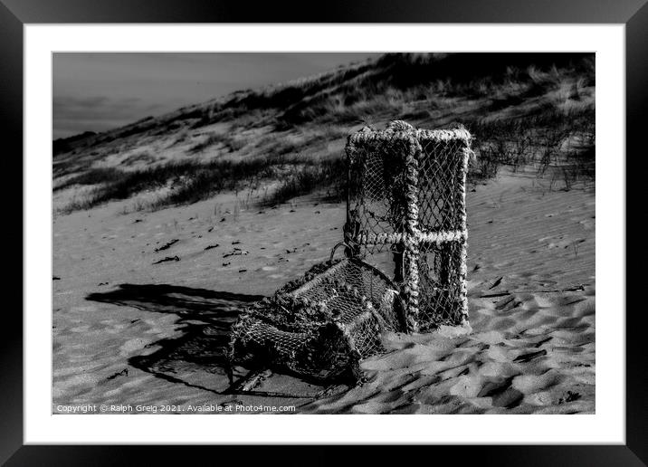 Lobster pots Framed Mounted Print by Ralph Greig