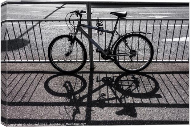 Bike Shadow Canvas Print by Allan Bell