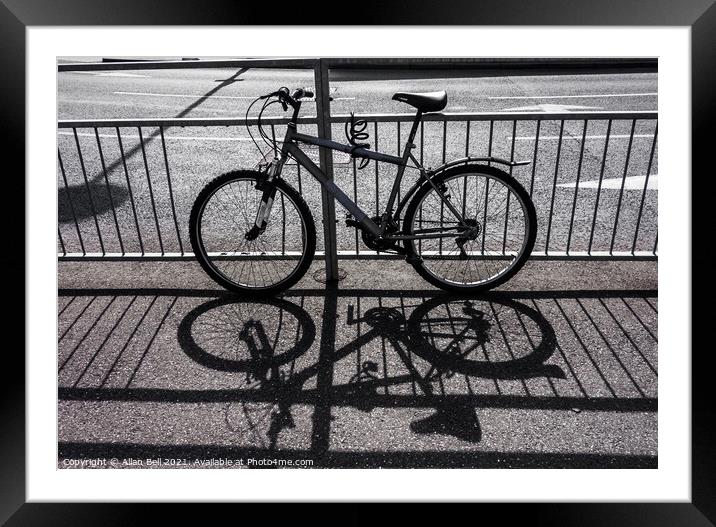 Bike Shadow Framed Mounted Print by Allan Bell