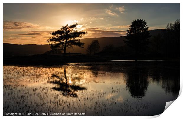 Dark sunset at Kelly hall tarn reflection in the l Print by PHILIP CHALK