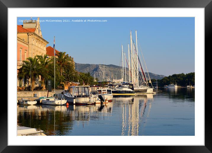Early morning light Stari Grad harbour, Croatia Framed Mounted Print by Angus McComiskey