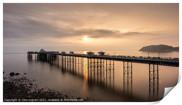 Pier at sunrise Print by Clive Ingram