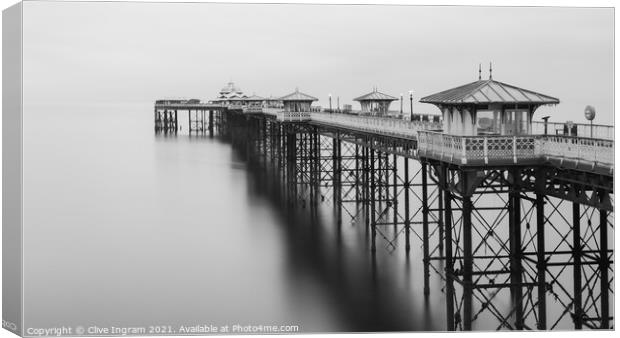 Tranquil Dawn on the Desolate Pier Canvas Print by Clive Ingram