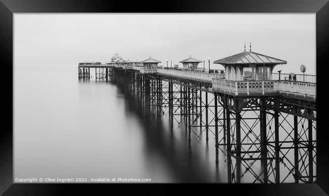 Tranquil Dawn on the Desolate Pier Framed Print by Clive Ingram