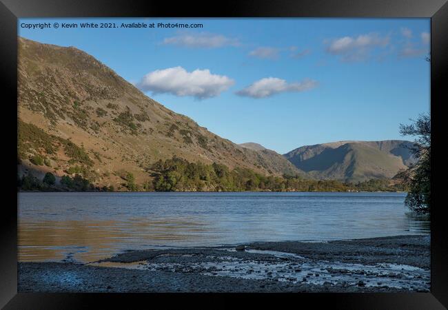 Serene Ullswater on an early summers evening Framed Print by Kevin White
