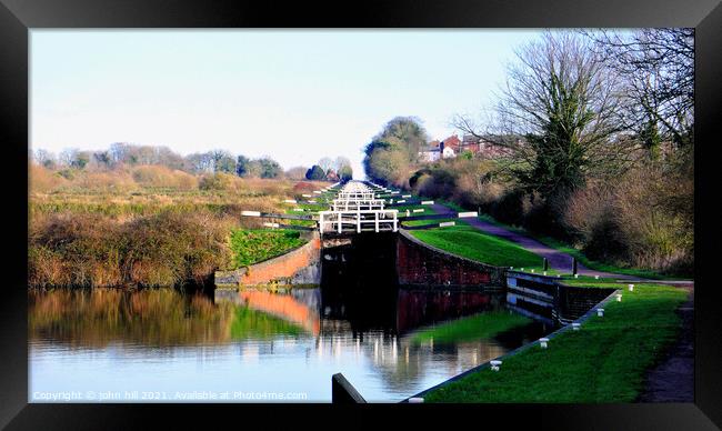 Caen hill canal locks at Devizes in Wiltshire, UK. Framed Print by john hill