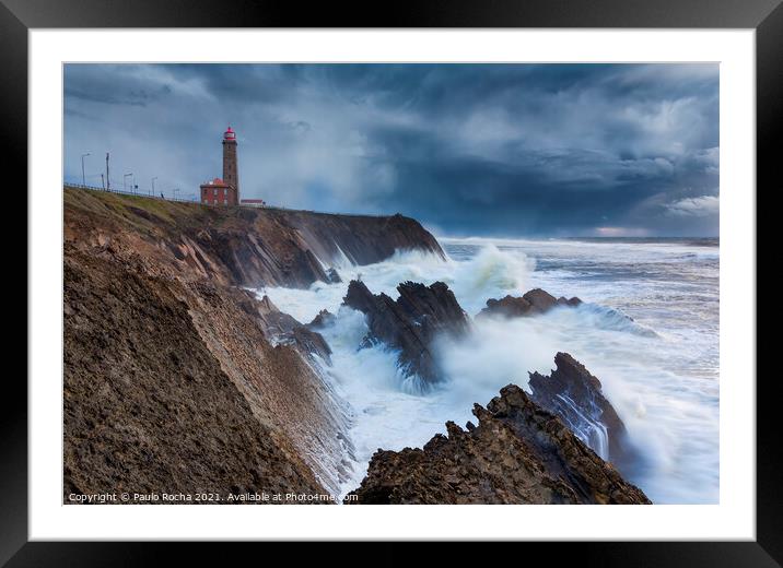 The lighthouse and the storm Framed Mounted Print by Paulo Rocha