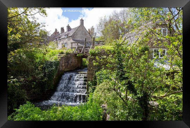 Weir / Waterfall in Corfe Castle Village, Dorset, UK Framed Print by Derek Daniel
