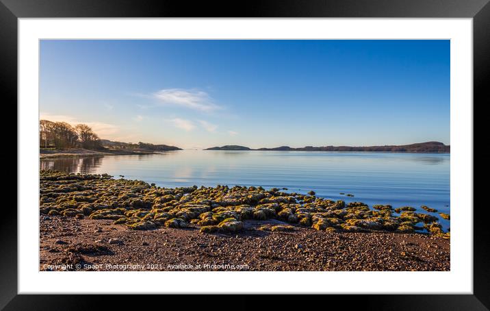 Rocky beach at low tide on a winters morning at Kirkcudbright Bay Framed Mounted Print by SnapT Photography