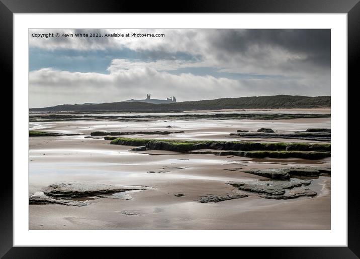 Dunstanburgh castle from Embleton beach Framed Mounted Print by Kevin White