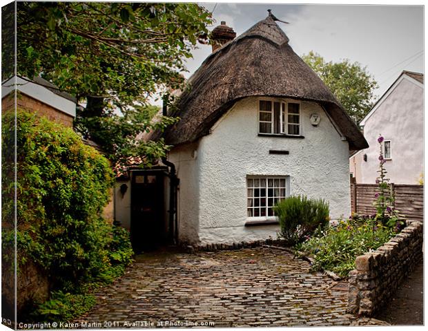 White Thatched Cottage Canvas Print by Karen Martin
