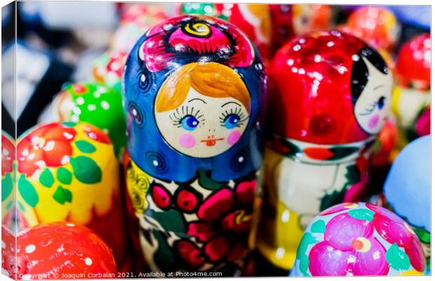 Beautiful wooden Russian-style matryoshka dolls. Canvas Print by Joaquin Corbalan