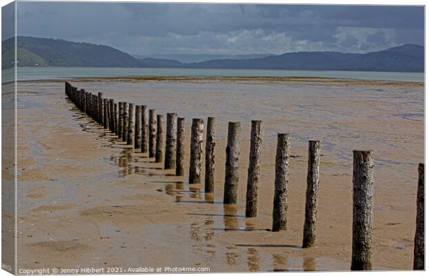 Breakwater posts on Ynylas Nature reserve, looking across Snowdon mountains Canvas Print by Jenny Hibbert