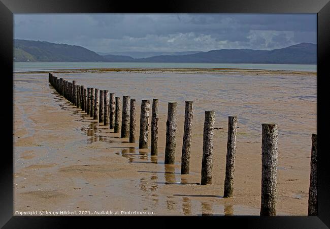 Breakwater posts on Ynylas Nature reserve, looking across Snowdon mountains Framed Print by Jenny Hibbert