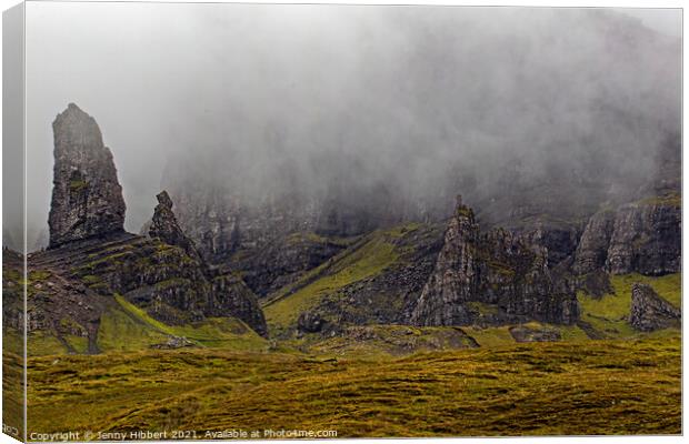 Misty view of The Old man of Storr on the Isle of Skye Canvas Print by Jenny Hibbert