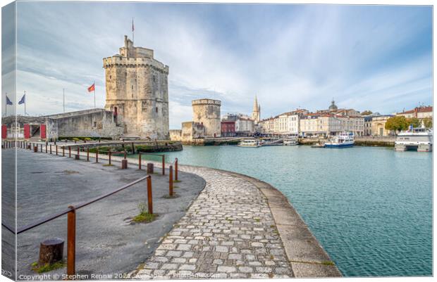 Two medieval towers at the entrance to La Rochelle Canvas Print by Stephen Rennie