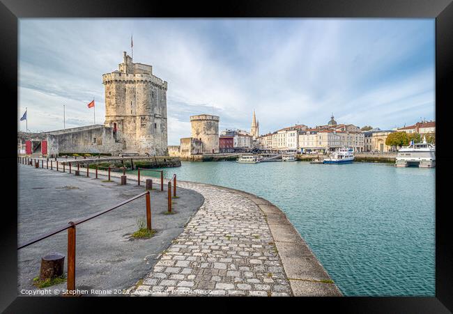 Two medieval towers at the entrance to La Rochelle Framed Print by Stephen Rennie