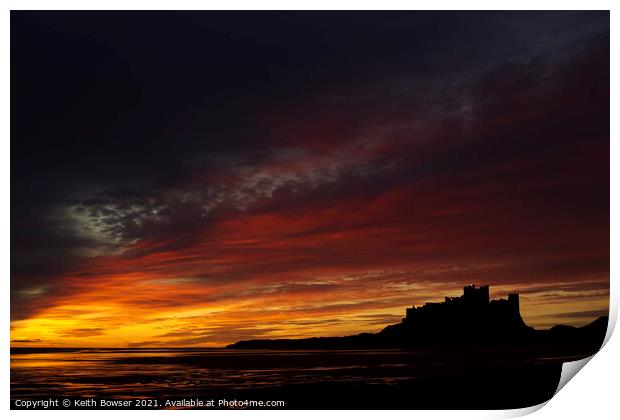Bamburgh Castle at sunrise Print by Keith Bowser