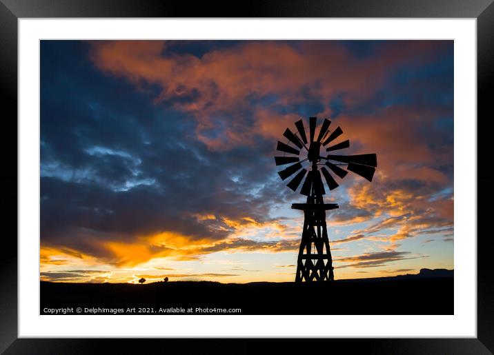 American windmill at sunset, dramatic sky Framed Mounted Print by Delphimages Art