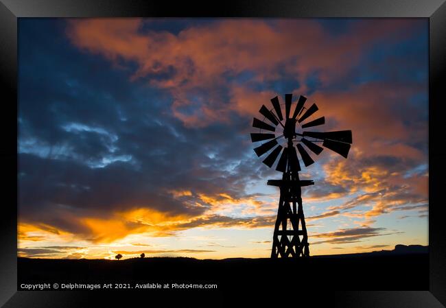 American windmill at sunset, dramatic sky Framed Print by Delphimages Art