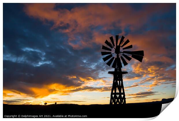 American windmill at sunset, dramatic sky Print by Delphimages Art