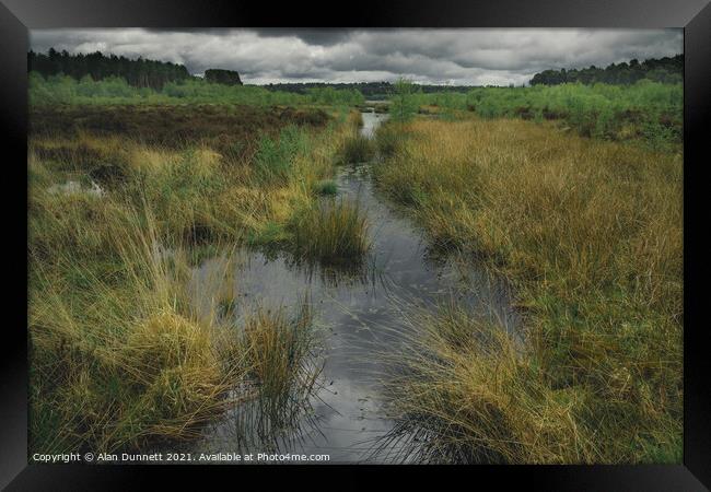 Between storms at Blakemere Moss Framed Print by Alan Dunnett