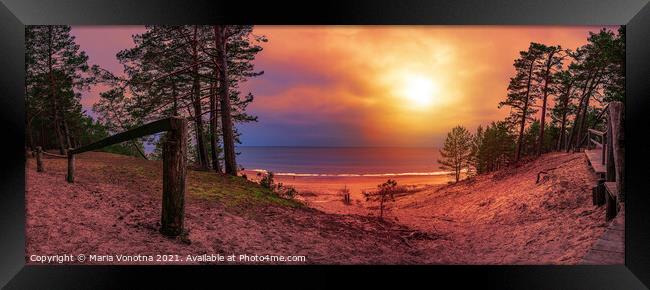 Colorful sunset over sea and pine forest Framed Print by Maria Vonotna