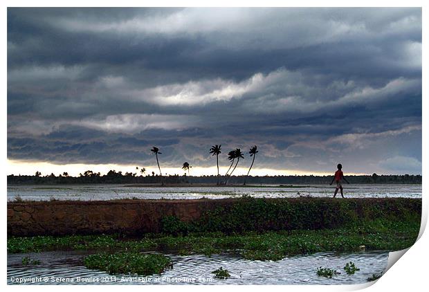 Boy Walking in a Storm, Kerala, India Print by Serena Bowles