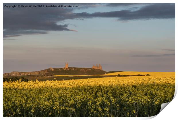 Dunstanburgh Castle just before sunset Print by Kevin White