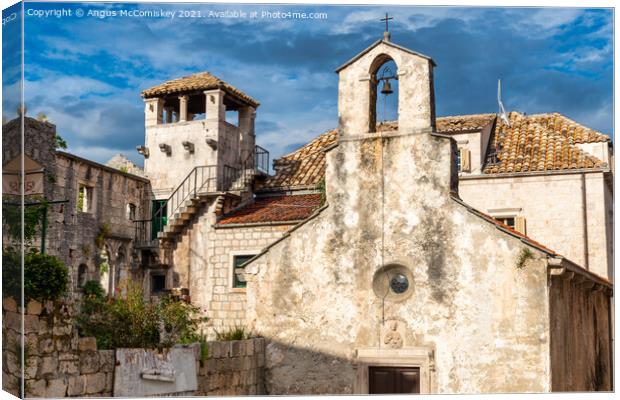 Church of All Saints and Marco Polo Tower, Korcula Canvas Print by Angus McComiskey