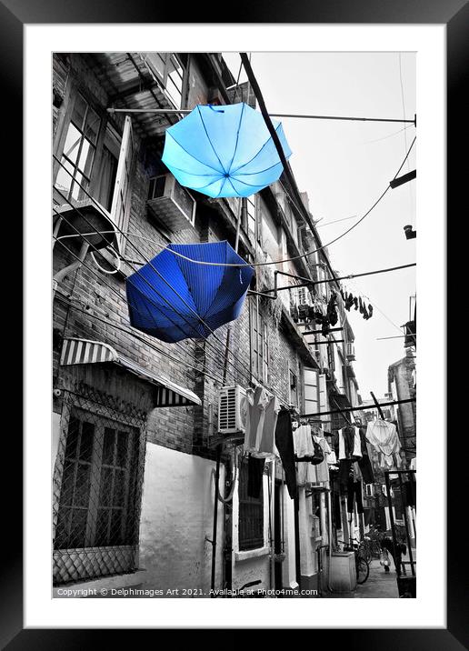 Shanghai, China. Umbrellas in a street after the r Framed Mounted Print by Delphimages Art
