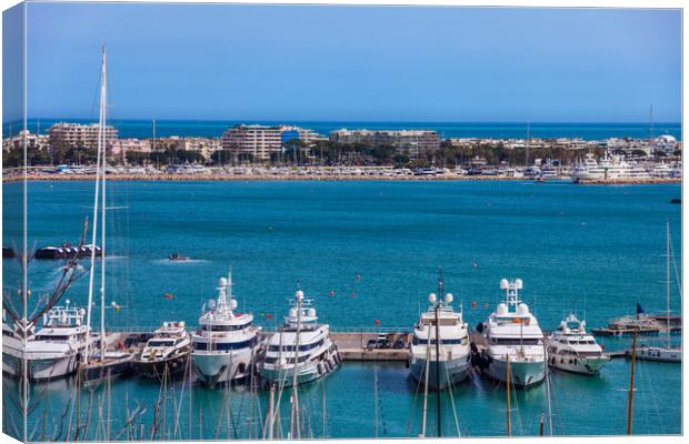 Yachts in French Riviera and Cannes City Skyline Canvas Print by Artur Bogacki