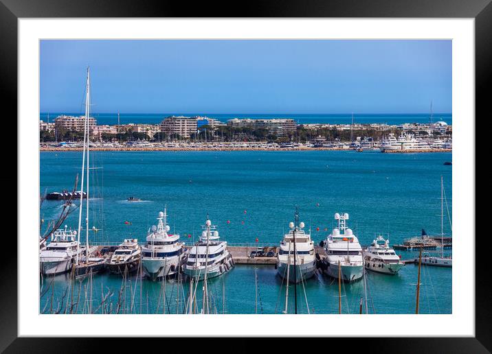 Yachts in French Riviera and Cannes City Skyline Framed Mounted Print by Artur Bogacki